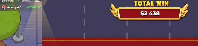 The top of the game screen inside a casino lobby, showing a live-wins ticker with an online player count and a recent payout